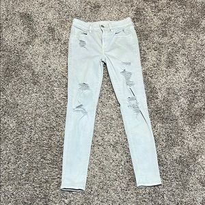 Women's Distressed Light Blue Jeans